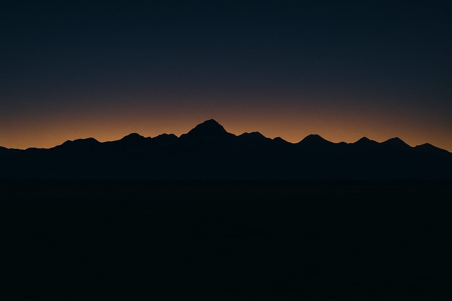 Rocky Mountain front range silhouetted at dusk